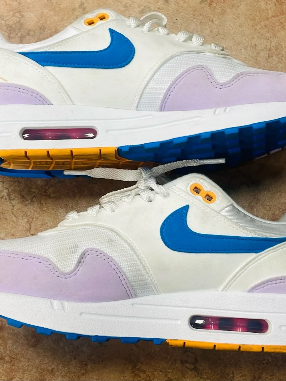Nike Women’s White Sneakers with Pink, Blue & Lavender Accents
